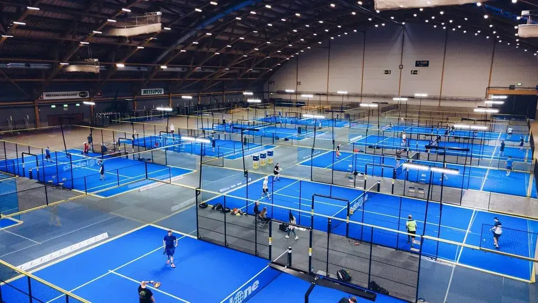 People playing paddleball